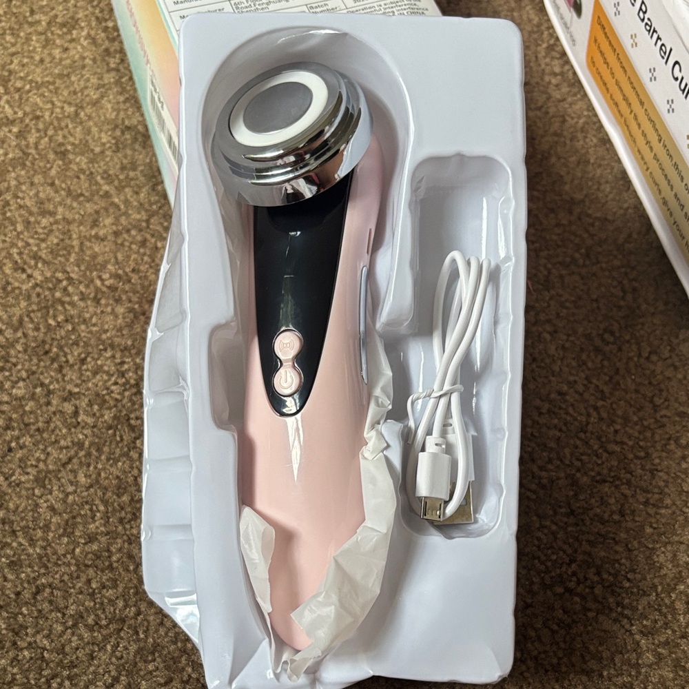 Advanced Pink and Black Skincare Device